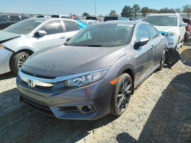 Photo 2 from auction – 2017 HONDA CIVIC LX with VIN 19XFC2E51HE068053