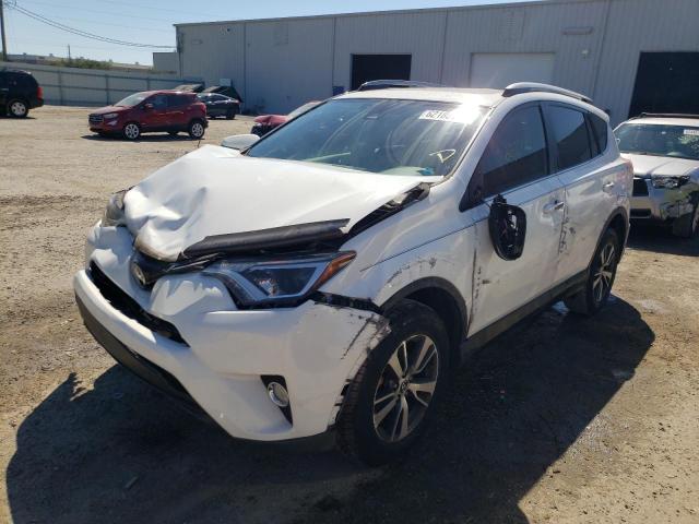Photo 2 from auction – 2017 TOYOTA RAV4 XLE with VIN JTMWFREV5HJ138317