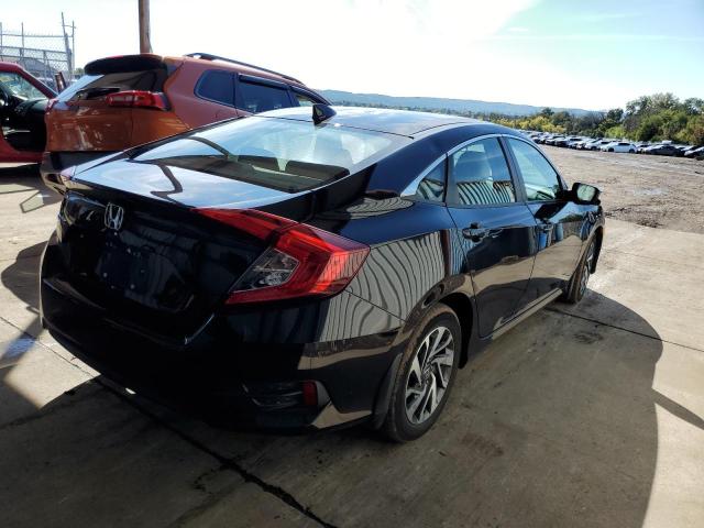 Photo 4 from auction – 2018 HONDA CIVIC EX with VIN 2HGFC2F71JH566099