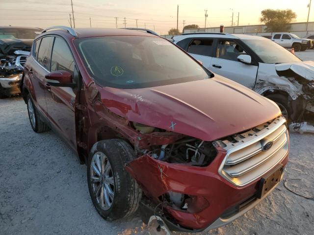 FORD ESCAPE TIT 2017 with VIN 1FMCU0J98HUD60244 - Photo from auction
