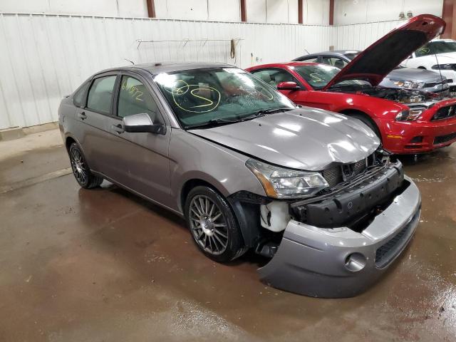 FORD FOCUS SES 2011 with VIN 1FAHP3GN7BW147357 - Photo from auction