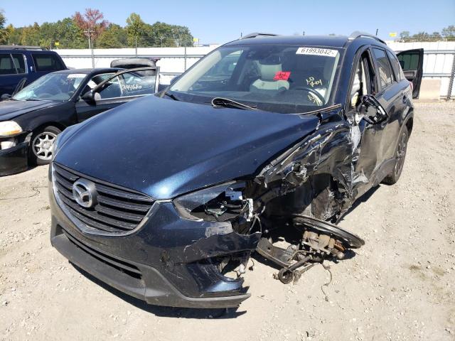 Photo 2 from auction – 2016 MAZDA CX-5 GT with VIN JM3KE4DY1G0877602