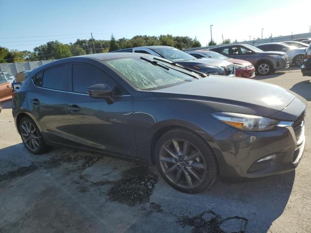 MAZDA 3 TOURING 2018 with VIN 3MZBN1L32JM163671 - Photo from auction