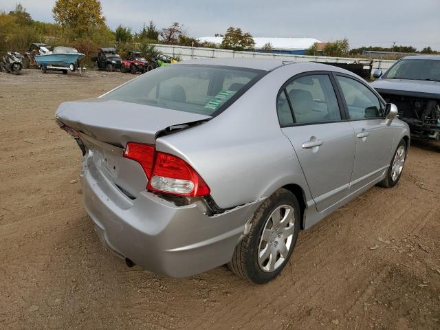Photo 4 from auction – 2011 HONDA CIVIC LX with VIN 19XFA1F52BE030725