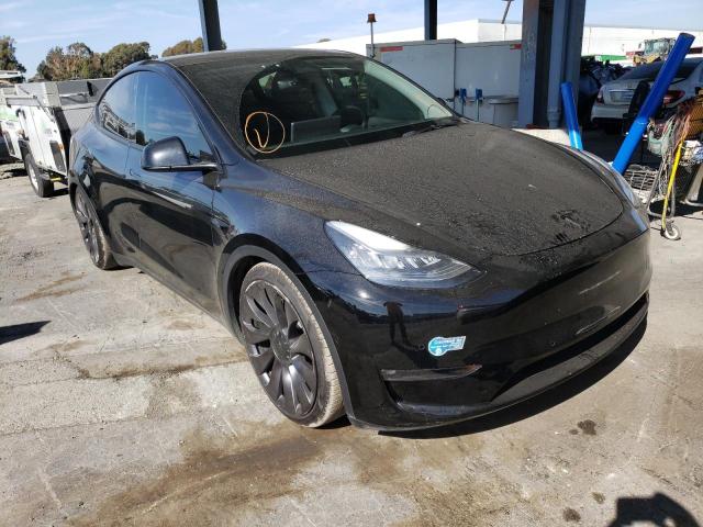 TESLA MODEL Y 2021 with VIN 5YJYGAEE8MF159655 - Photo from auction