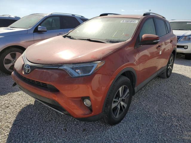 Photo 2 from auction – 2016 TOYOTA RAV4 XLE with VIN JTMWFREV1GJ091723