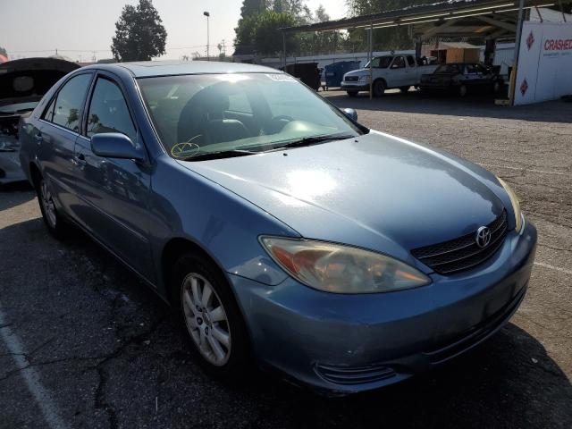 Photo 1 from auction – 2002 TOYOTA CAMRY LE with VIN 4T1BE30K72U585082