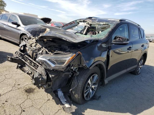 Photo 2 from auction – 2016 TOYOTA RAV4 XLE with VIN 2T3RFREVXGW470055