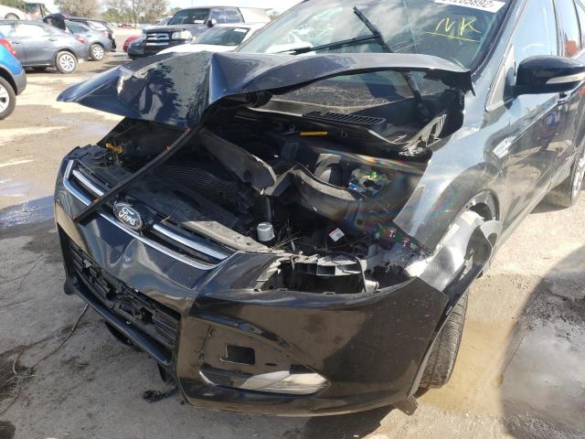 Photo 9 from auction – 2014 FORD ESCAPE TIT with VIN 1FMCU9J98EUC15592