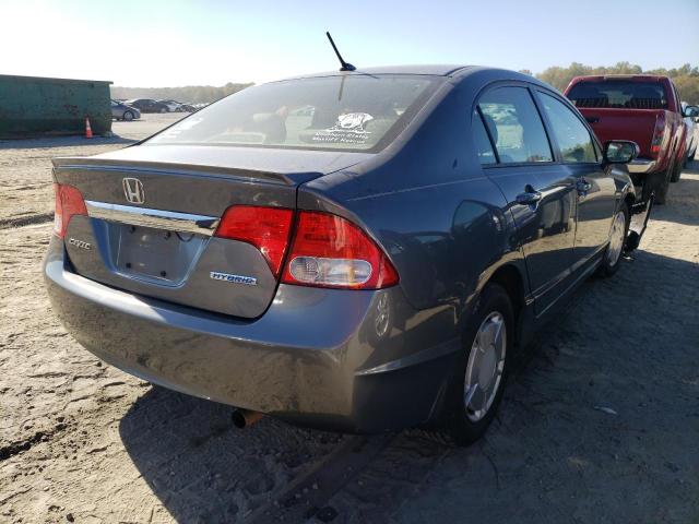 Photo 4 from auction – 2010 HONDA CIVIC HYBR with VIN JHMFA3F24AS005546