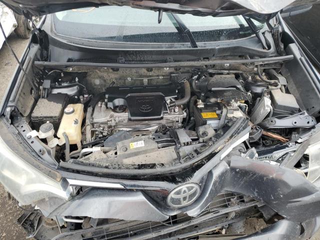 Photo 7 from auction – 2018 TOYOTA RAV4 LE with VIN JTMZFREV1JJ200508