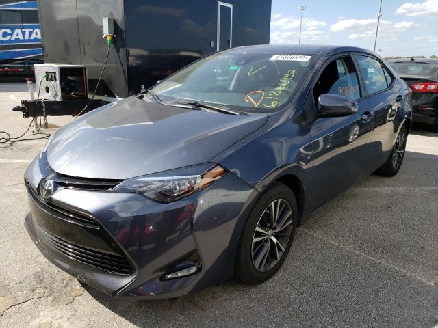 Photo 2 from auction – 2018 TOYOTA COROLLA L with VIN 5YFBURHE6JP779610