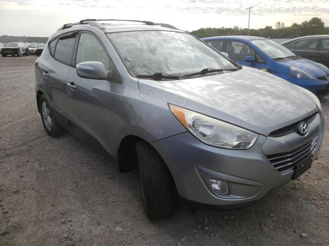 HYUNDAI TUCSON GLS 2013 with VIN KM8JUCAC8DU694028 - Photo from auction