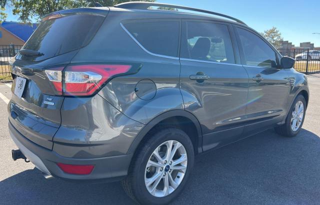 Photo 4 from auction – 2018 FORD ESCAPE SE with VIN 1FMCU0GD3JUB58445