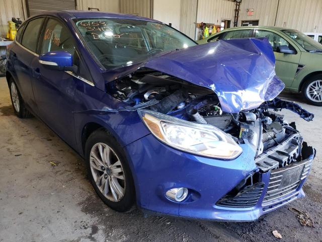 FORD FOCUS 2012 with VIN 1FAHP3M23CL348587 - Photo from auction