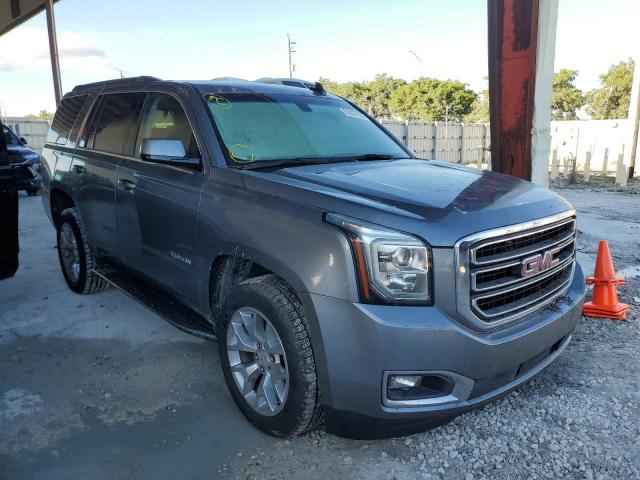 GMC YUKON SLE 2018 with VIN 1GKS1AKC7JR381401 - Photo from auction