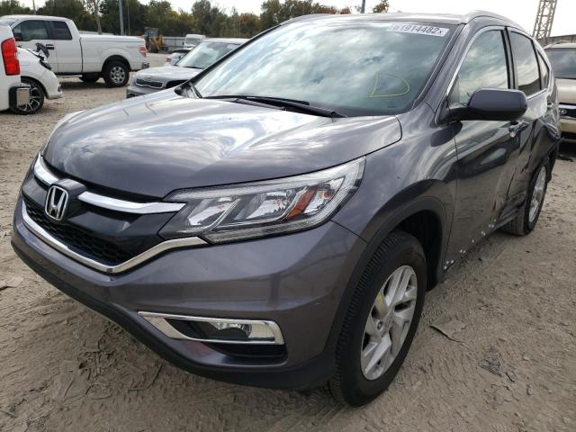 Photo 2 from auction – 2015 HONDA CR-V EXL with VIN 2HKRM4H73FH686972