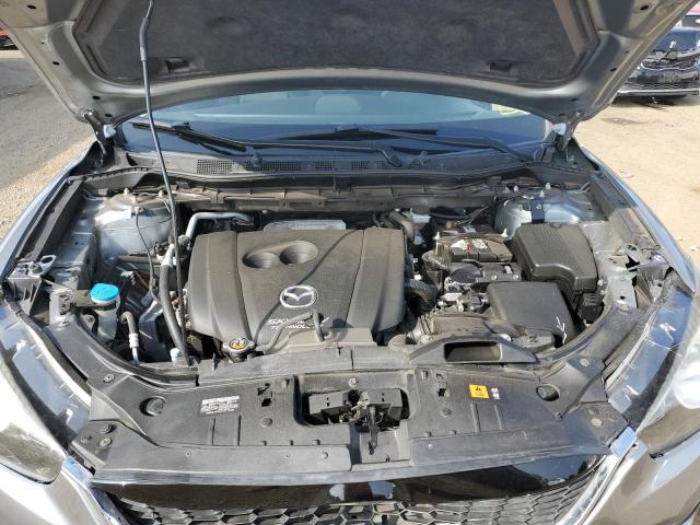 Photo 7 from auction – 2014 MAZDA CX-5 SPORT with VIN JM3KE2BE3E0358819