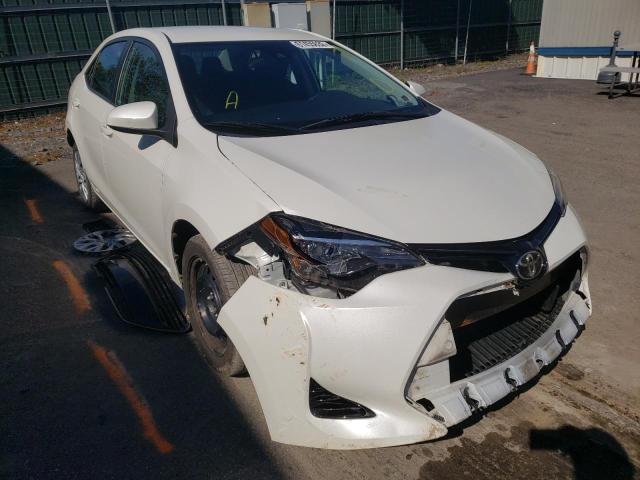 TOYOTA COROLLA L 2018 with VIN 5YFBURHE7JP797095 - Photo from auction