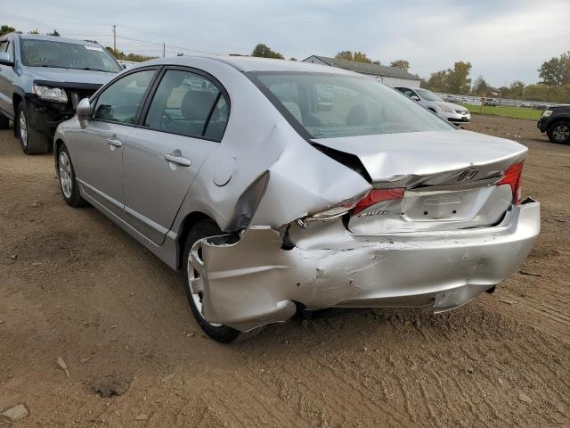 Photo 3 from auction – 2011 HONDA CIVIC LX with VIN 19XFA1F52BE030725