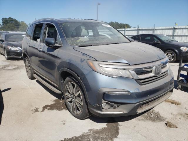HONDA PILOT ELIT 2020 with VIN 5FNYF6H05LB003281 - Photo from auction
