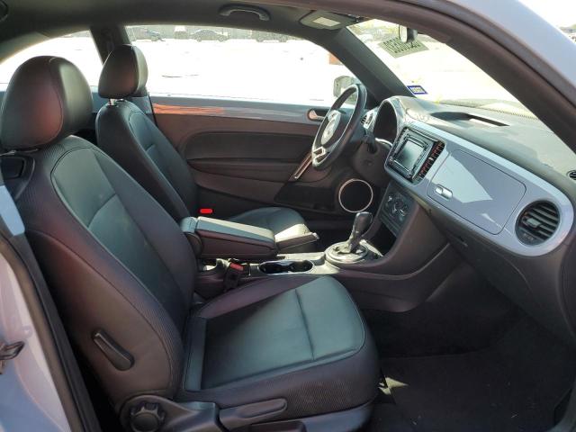 Photo 5 from auction – 2014 VOLKSWAGEN BEETLE with VIN 3VWJ07AT8EM664263