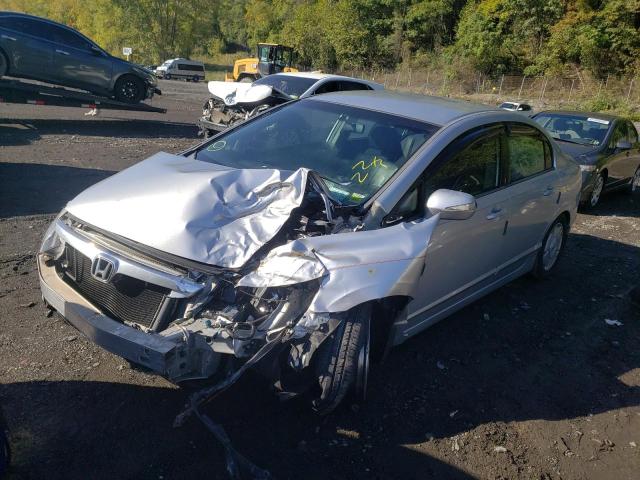 Photo 2 from auction – 2006 HONDA CIVIC HYBR with VIN JHMFA36296S027744