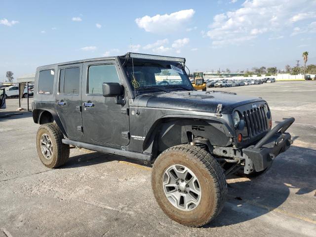 JEEP WRANGLER U 2010 with VIN 1J4HA6H10AL128720 - Photo from auction