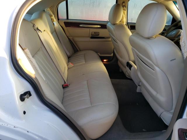 Photo 6 from auction – 2004 LINCOLN TOWN CAR E with VIN 1LNHM81W64Y625854