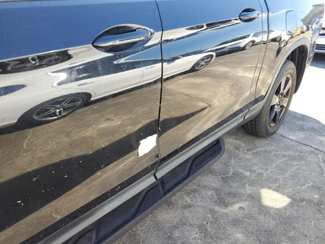 Photo 9 from auction – 2017 HONDA RIDGELINE with VIN 5FPYK3F8XHB015363
