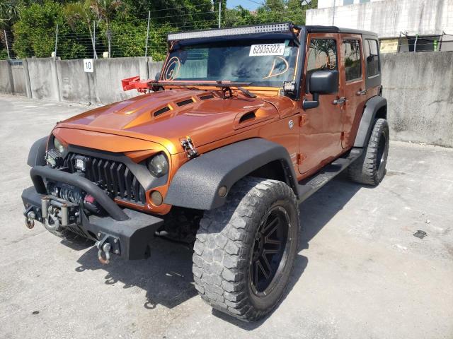 Photo 2 from auction – 2011 JEEP WRANGLER U with VIN 1J4BA3H15BL629656