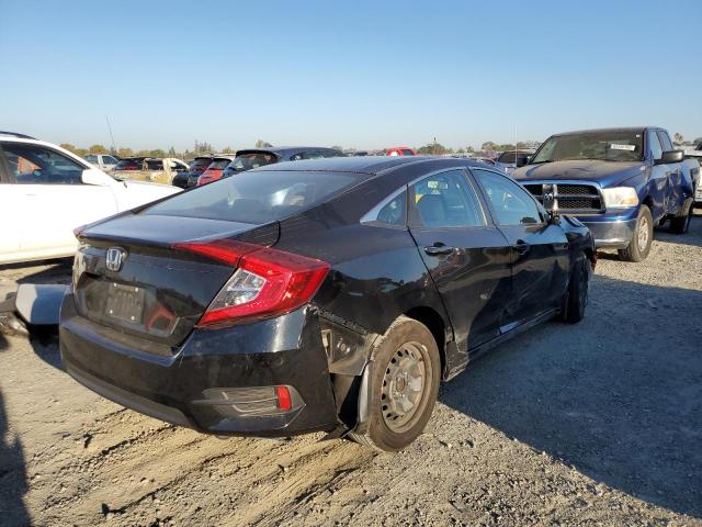 Photo 4 from auction – 2017 HONDA CIVIC LX with VIN 2HGFC2F59HH563234