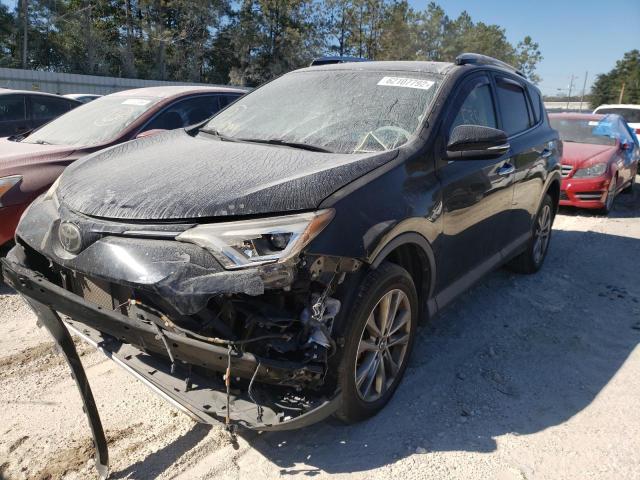 Photo 2 from auction – 2016 TOYOTA RAV4 LIMIT with VIN 2T3YFREV6GW260502