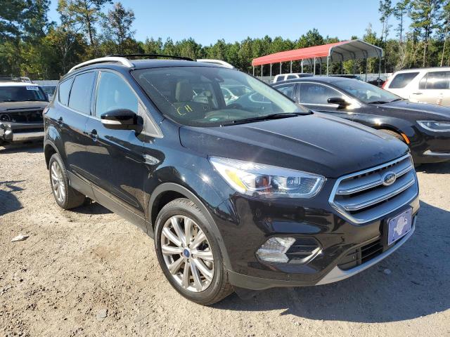 FORD ESCAPE TIT 2018 with VIN 1FMCU0J97JUD40976 - Photo from auction