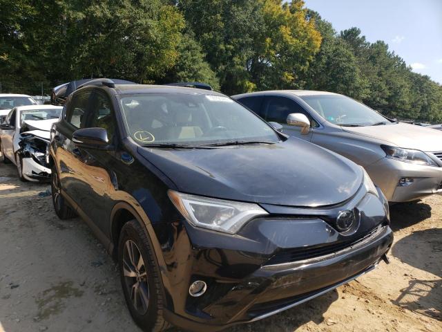 Photo 1 from auction – 2017 TOYOTA RAV4 XLE with VIN 2T3WFREV5HW331858