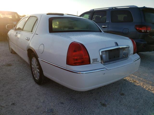 Photo 3 from auction – 2004 LINCOLN TOWN CAR E with VIN 1LNHM81W64Y625854