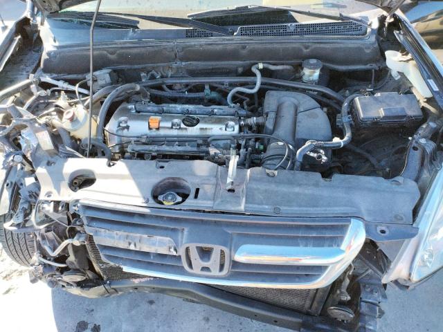 Photo 7 from auction – 2002 HONDA CR-V LX with VIN JHLRD68412C025628