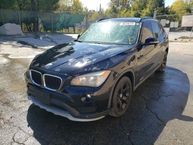 Photo 2 from auction – 2015 BMW X1 SDRIVE2 with VIN WBAVM1C54FVW58968