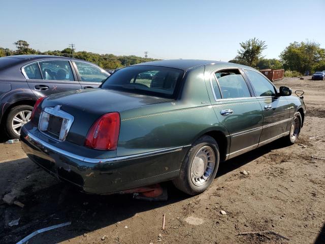 Photo 4 from auction – 2000 LINCOLN TOWN CAR E with VIN 1LNHM81W3YY831798