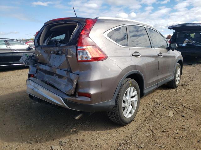 Photo 4 from auction – 2015 HONDA CR-V EXL with VIN 5J6RM4H79FL115296