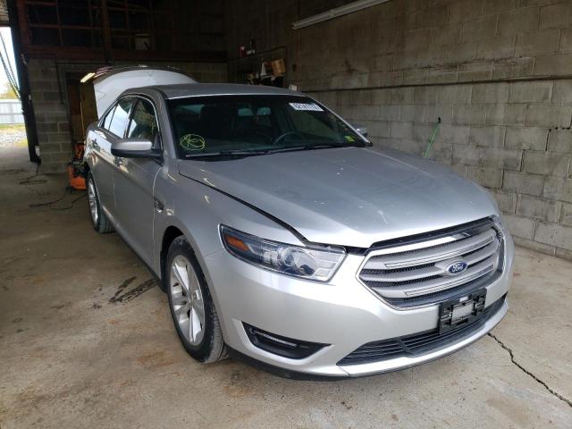 FORD TAURUS SEL 2015 with VIN 1FAHP2E8XFG182840 - Photo from auction