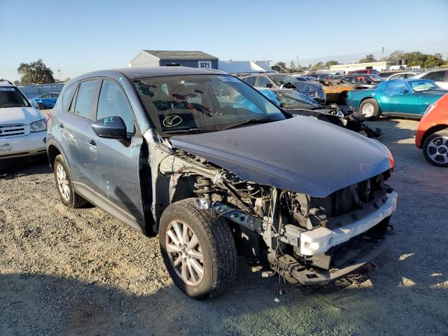 MAZDA CX-5 SPORT 2014 with VIN JM3KE2BE3E0399497 - Photo from auction