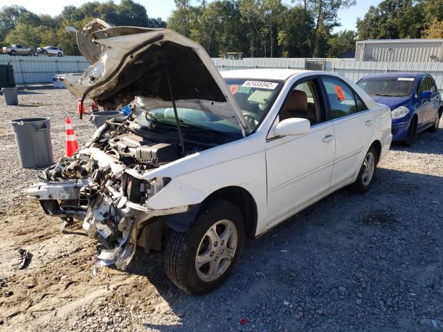 Photo 2 from auction – 2002 TOYOTA CAMRY LE with VIN JTDBE32K020070238