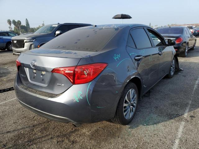 Photo 4 from auction – 2018 TOYOTA COROLLA L with VIN 5YFBURHE0JP809054