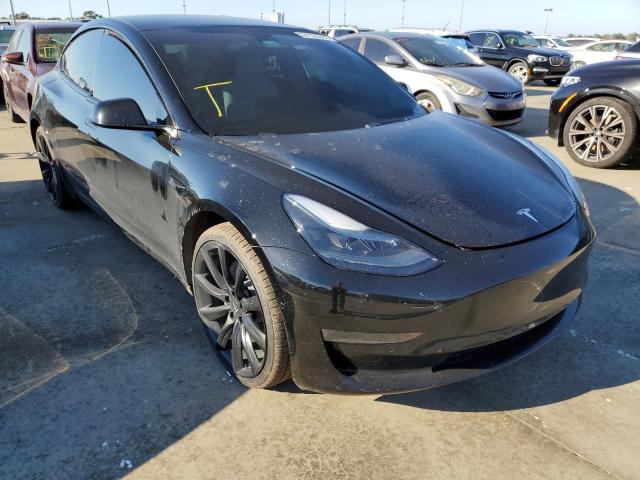 TESLA MODEL 3 2021 with VIN 5YJ3E1EAXMF080985 - Photo from auction