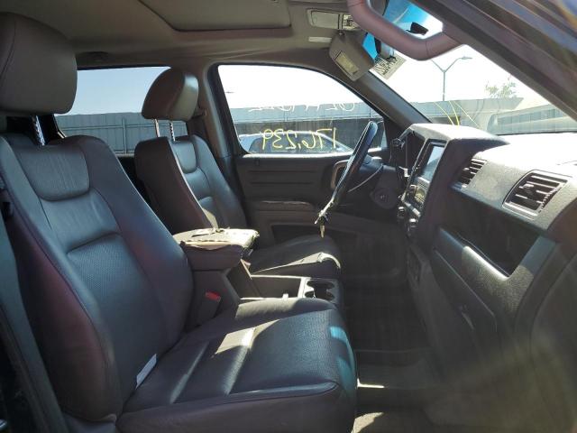 Photo 5 from auction – 2010 HONDA RIDGELINE with VIN 5FPYK1F56AB001914