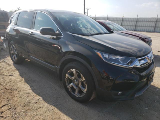 HONDA CR-V EX 2018 with VIN 5J6RW1H50JA007399 - Photo from auction