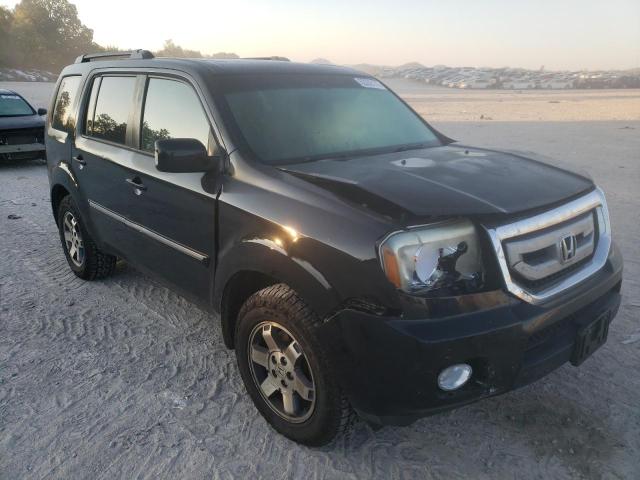 HONDA PILOT TOUR 2010 with VIN 5FNYF4H94AB037700 - Photo from auction