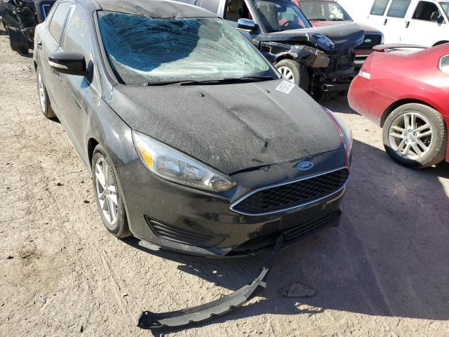 Photo 9 from auction – 2015 FORD FOCUS SE with VIN 1FADP3F20FL379957