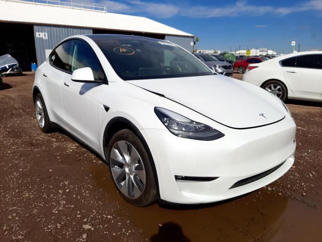 TESLA MODEL Y 2021 with VIN 5YJYGDEE0MF305497 - Photo from auction